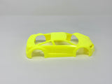 Jomurema GT01 car body in neon yellow, showing sleek aerodynamic design and vibrant color on a sports car.