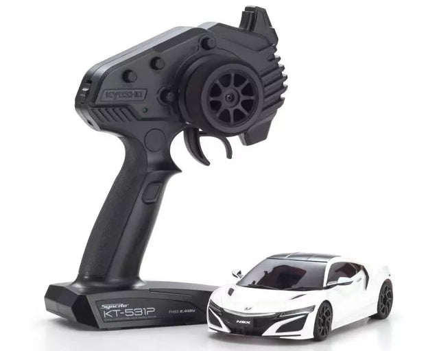 Kyosho Mini-Z RWD MR04 Honda NSX remote control car on a track, showcasing detailed exterior and sleek design.