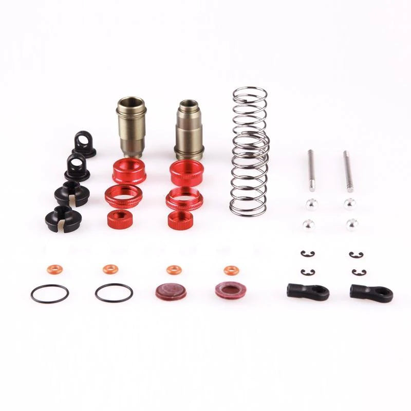 LC Racing L6021 rear shock set with two silver shock absorbers and mounting hardware on a neutral background.