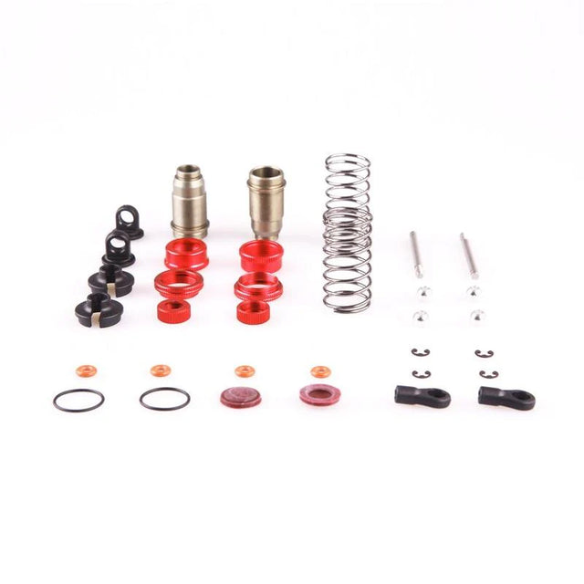 LC Racing L6022 front shock set showing two black shocks with gold accents and mounting components for RC car suspension.