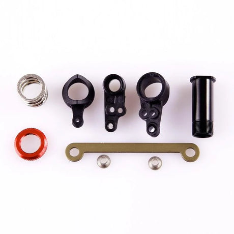 LC Racing L6023 steering bellcrank set showing metal arms and connecting components for RC car steering system