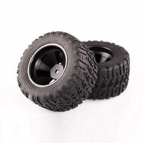 Pair of LC Racing L6061 MT 12mm mounted tires set, showing treads and rubber surface for RC off-road vehicles.