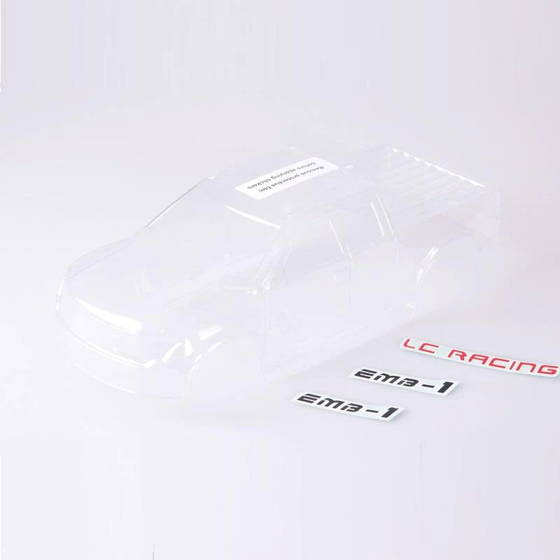 Clear polycarbonate body shell for LC Racing L6063 MT RC truck, shown from side angle with detailed contours.