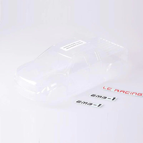 Clear polycarbonate body shell for LC Racing L6063 MT RC truck, shown from side angle with detailed contours.