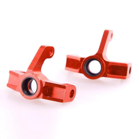 Aluminum steering block for RC car by LC Racing, part number L6083, showing the precise, lightweight metal component with mounting points.