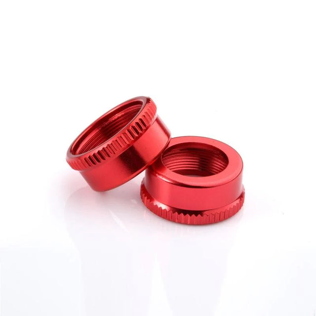 LC Racing L6112 shock upper cap made of aluminum, showing a close-up of the sleek, metallic shock component.