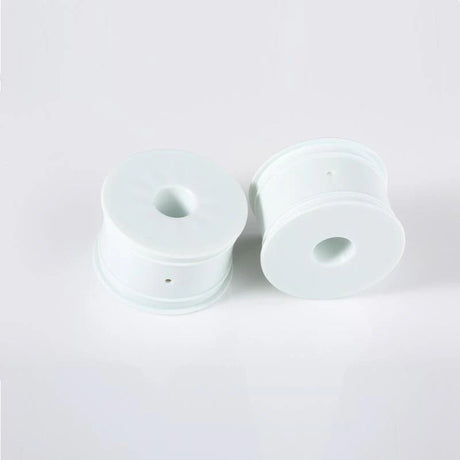 Pair of ivory LC Racing L6150 EMB Truggy wheels with detailed tread pattern for RC off-road vehicles.