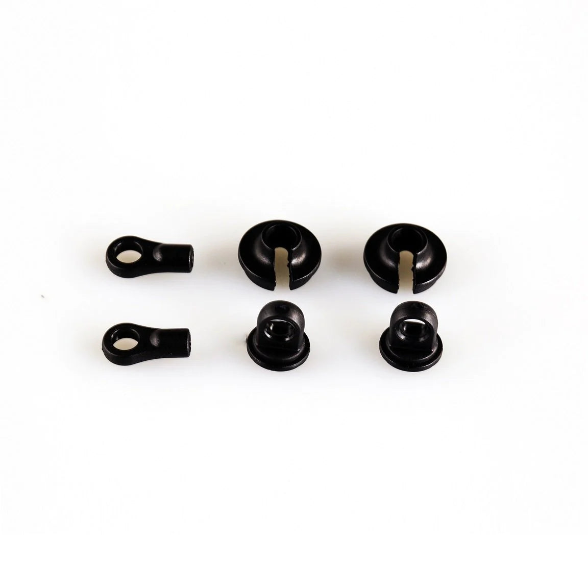 LC Racing L6187 shock caps, spring cups, and rod end set shown in a close-up image with detailed black and metal components.