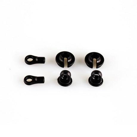 LC Racing L6187 shock caps, spring cups, and rod end set shown in a close-up image with detailed black and metal components.