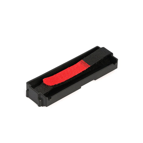 LC Racing L6254 battery mount for 34x106mm batteries, showing a durable black RC car component with mounting brackets
