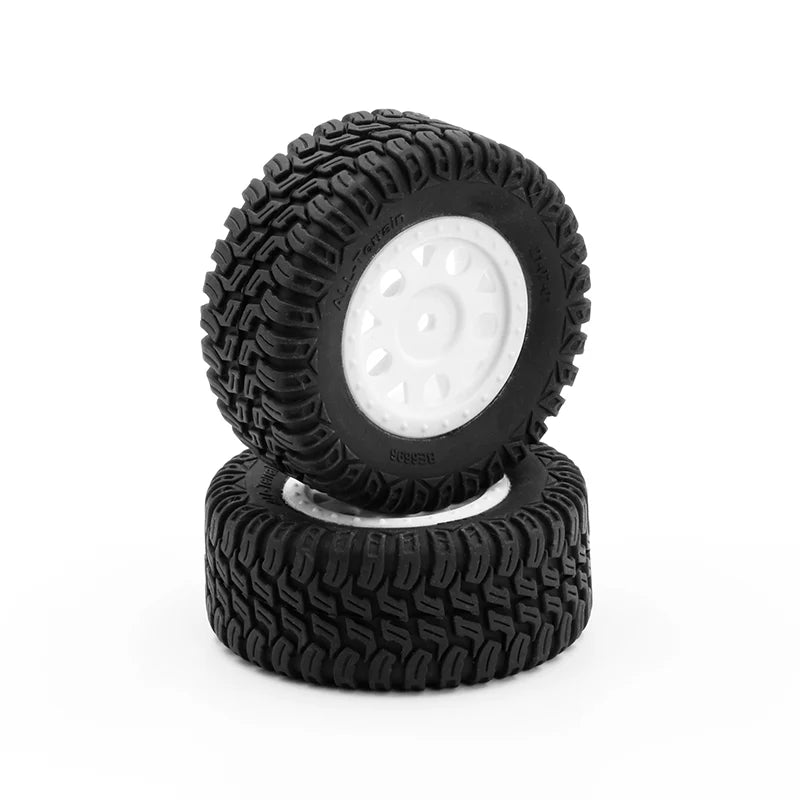 Pair of LC Racing L6267 short course truck tires in white for RC off-road vehicles, shown as a set in the image.