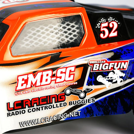 Pre-painted LC Racing L6241 1/14 scale polycarbonate short course truck body on a RC vehicle, showcasing sleek design and vibrant color.