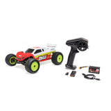 Losi 1/18 Mini-T 2.0 2S 2WD RTR brushless stadium truck on a track with detailed body and off-road tires.