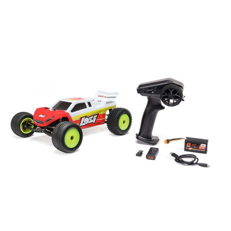 Losi 1/18 Mini-T 2.0 2S 2WD RTR brushless stadium truck on a track with detailed body and off-road tires.