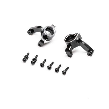 Losi aluminum spindles for Micro-B/T RC cars, shown in a close-up image with metallic finish and detailed construction.
