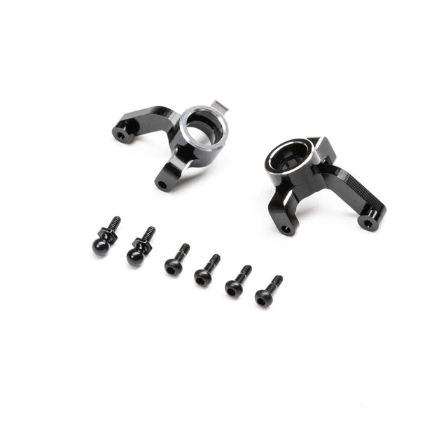 Losi aluminum spindles for Micro-B/T RC cars, shown in a close-up image with metallic finish and detailed construction.