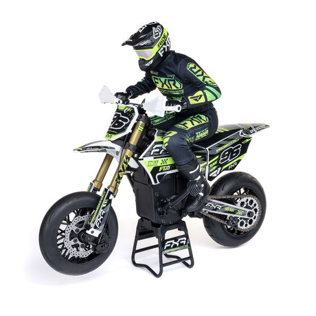 White Losi Promoto-SM 1/4 scale supermoto motorcycle with detailed body and racing tires, showcasing a sleek design.