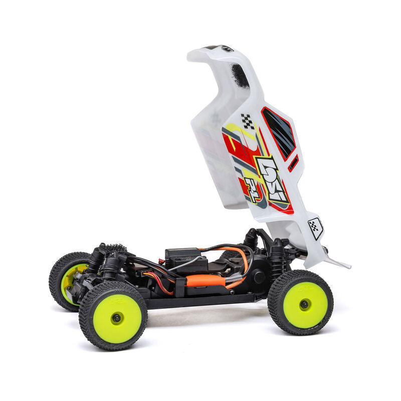 Losi Micro-T 2WD 1/28 scale truggy RC car on a track, showcasing its compact design and detailed exterior.