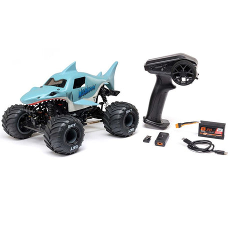 Losi 1/18 Mini LMT Megalodon 4x4 brushed monster truck on rugged terrain, showcasing detailed body and off-road tires.
