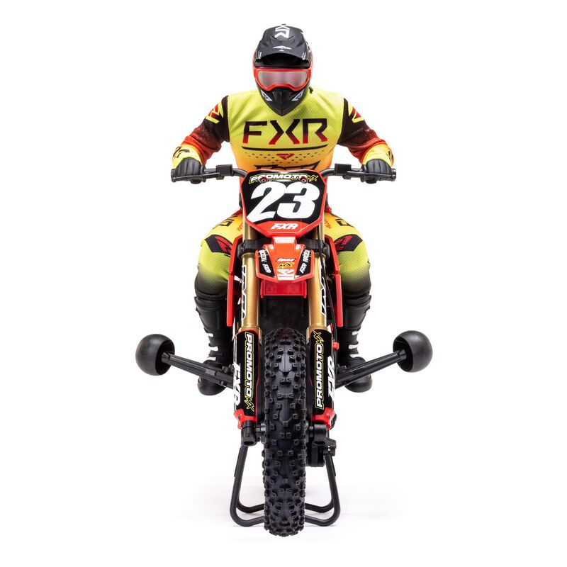 Red Losi 1/4 Promoto-MX FXR 2S RTR brushless motorcycle with detailed body and realistic design, ready for off-road riding.