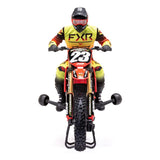 Red Losi 1/4 Promoto-MX FXR 2S RTR brushless motorcycle with detailed body and realistic design, ready for off-road riding.