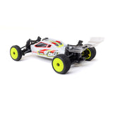 Losi Micro-B 2WD 1/24 scale RC buggy with black and orange body and detailed wheels, designed for off-road racing.