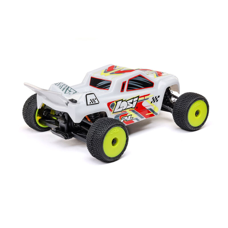 Losi Micro-T 2WD 1/28 scale truggy RC car with detailed body and off-road tires, shown from a side angle.