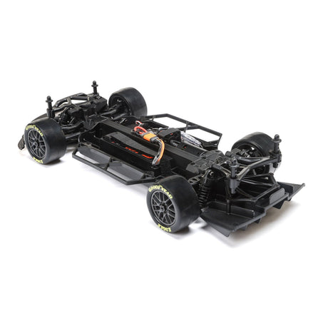 Losi 1/12 NASCAR RTR Joey Logano 2025 Ford Mustang remote control car on track, detailed yellow and black racing vehicle.