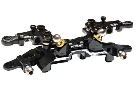 Atomic RC MRX double wishbone suspension conversion kit with detailed components and assembly parts for RC car upgrade.