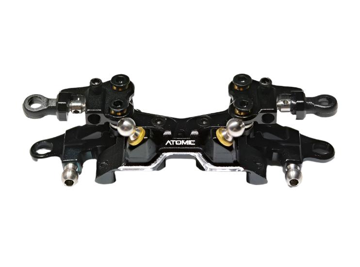 Atomic RC MRX double wishbone suspension conversion kit with detailed components for RC car upgrade.