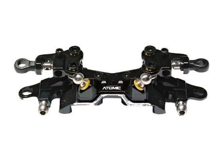 Atomic RC MRX double wishbone suspension conversion kit with detailed components for RC car upgrade.