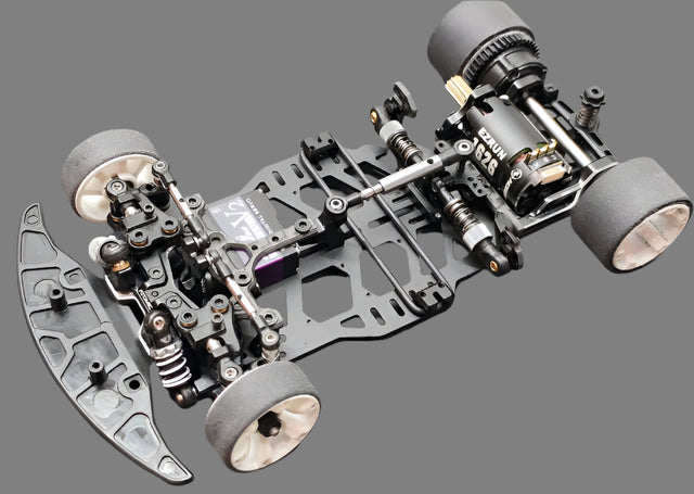 Atomic RC MRX Master Edition 2WD chassis with linkless suspension system for high-performance remote control car.