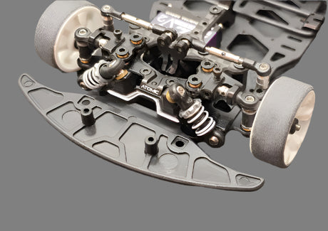 Atomic RC MRX Master Edition linkless 2WD chassis with sleek design and precision components for high-performance remote control car racing.