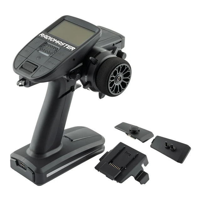 RadioMaster MT12 Surface Radio Controller with ergonomic grips, multiple control sticks, and a digital display for remote flying.