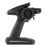 RadioMaster MT12 Surface Radio Controller with ergonomic grips, control sticks, and multiple switches for remote drone or RC aircraft flying.
