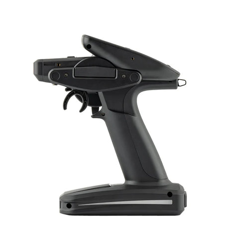 RadioMaster MT12 Surface Radio Controller with ergonomic grips, dual joysticks, and multiple control switches for RC drone flying.