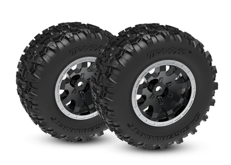 Traxxas Mini Maxx and XRT 4-inch front wheels with tires, designed for remote control off-road trucks.