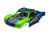 Green Traxxas Mini Slash 4X4 RC truck body with detailed design and clear windows, designed for durability and realistic appearance.