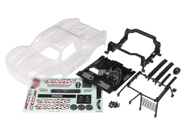 Traxxas Mini Slash 4X4 clear body shell for RC truck, showing detailed transparent plastic design and shape.