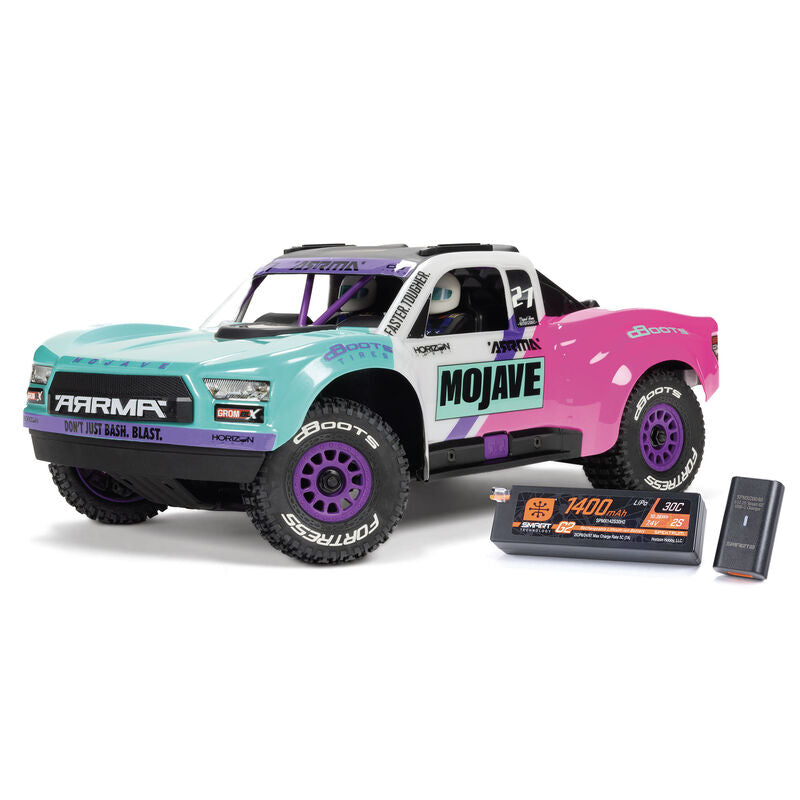ARRMA Mojave GROM 223S DSC 4X4 RTR brushless desert truck with rugged tires and desert-themed design.