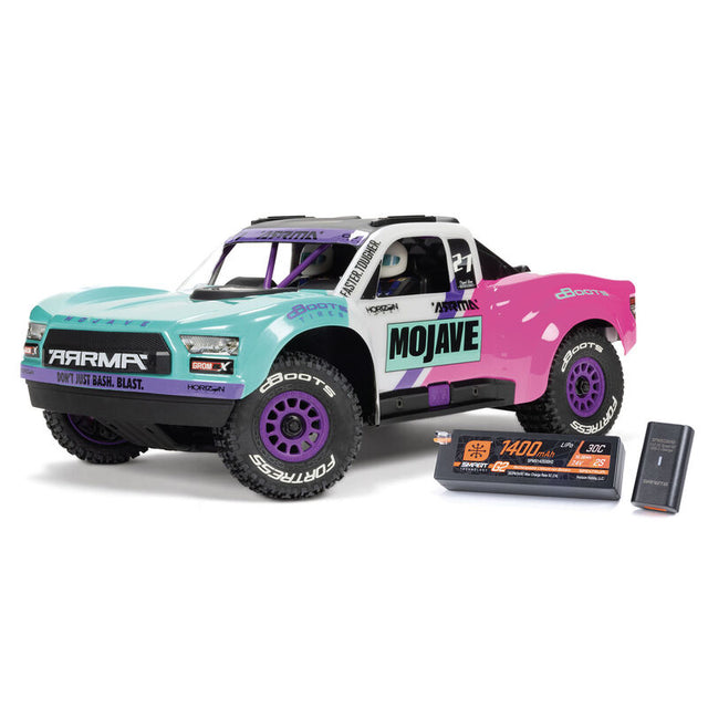 ARRMA Mojave GROM 223S DSC 4X4 RTR brushless desert truck with rugged tires and desert-themed design.