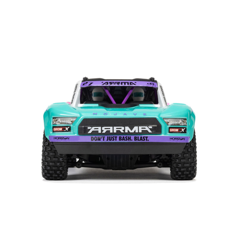 ARRMA Mojave GROM 223S DSC 4X4 RTR brushless desert truck with off-road tires and detailed desert-themed body design.