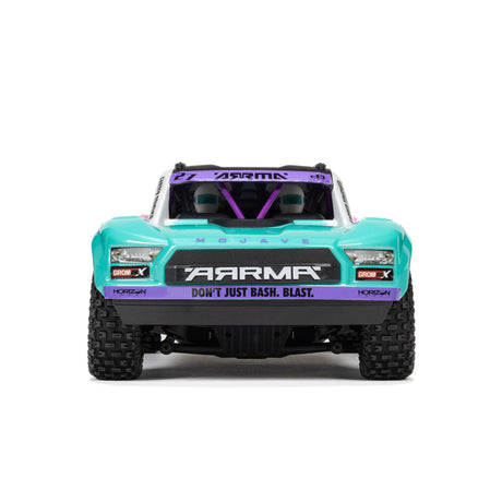 ARRMA Mojave GROM 223S DSC 4X4 RTR brushless desert truck with off-road tires and detailed desert-themed body design.