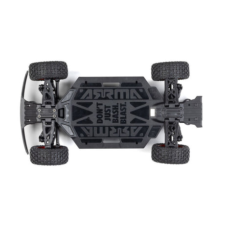 ARRMA 1/16 Mojave GROM 4x4 RTR brushed desert truck with rugged tires and detailed body, ready for off-road adventures.
