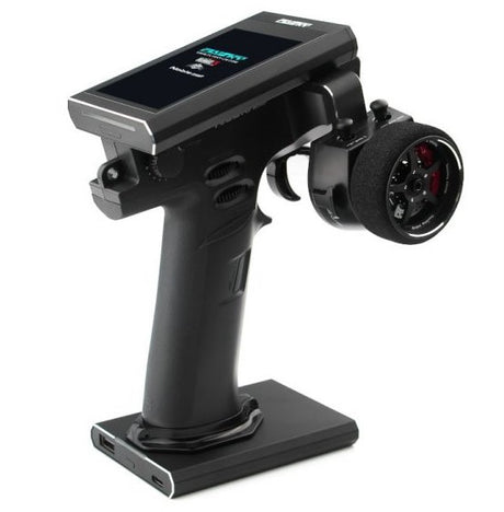 Flysky Noble NB4+ RC transmitter with FGr4B receiver, showcasing the transmitter's control sticks, screen, and buttons.