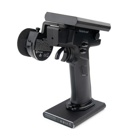 Flysky Noble NB4+ RC transmitter with FGr4B receiver, featuring multiple control sticks and digital display screen.