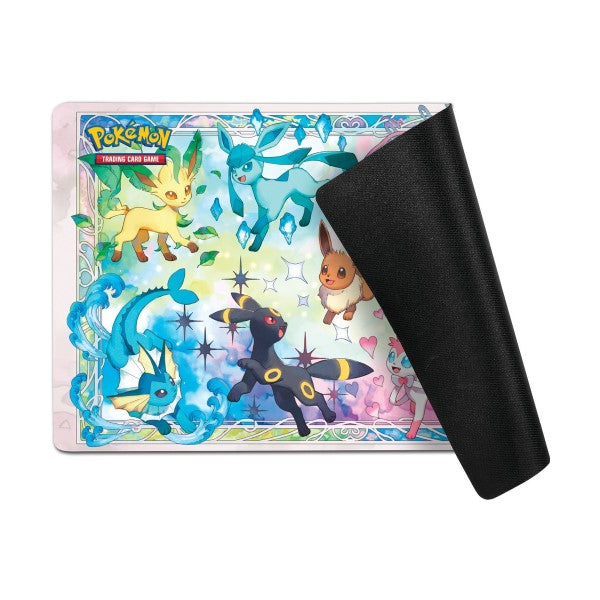 Pokémon TCG Prismatic Evolutions Super-Premium Collection box with cards and accessories, featuring Pokémon branding and vibrant design.