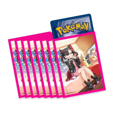 Pokémon TCG Marnie Premium Tournament Collection box featuring Marnie artwork and card accessories for Pokémon trading card games.