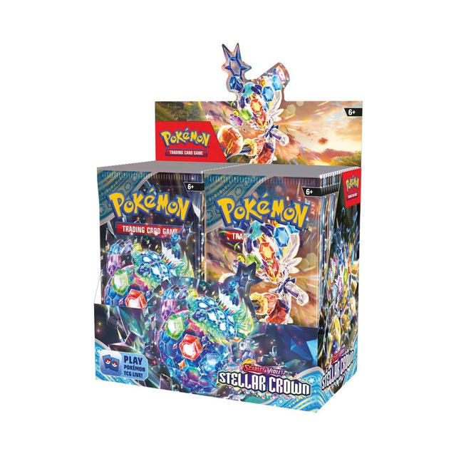 Pokemon Stellar Crown Booster Box with colorful packaging and multiple booster packs displayed in a row.