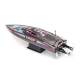 Proboat Heatwave Recoil 2 V2 26-inch self-righting boat with sleek design and vibrant colors floating on water.